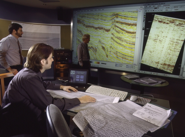 Interpreting seismic data at the Veritas Visualisation Centre in Perth (courtesy Veritas)