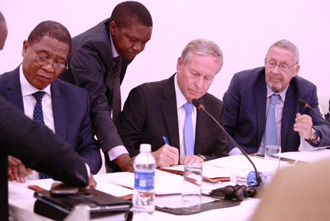 Premier Colin Barnett signs a MoU during the African trip