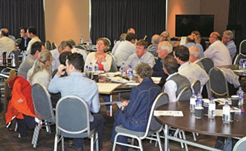 Participants discuss unconventional gas industry concerns and aspirations in groups during the Port Denison community workshop in October. 