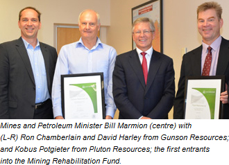 Mines and Petroleum Minister Bill  Marmion (centre) with (L-R) Ron Chamberlain and David Harley from Gunson  Resources; and Kobus Potgieter from Pluton Resources; the first entrants into  the Mining Rehabilitation Fund.
