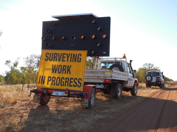 Safety notices on the roadside during seismic surveying operations in the Canning Basin (courtesy Geoscience Australia)