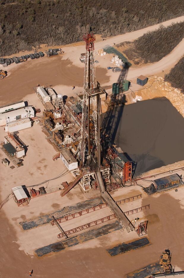 Aerial view of a well pad with drilling rig and evaporation sump in the northern Perth Basin (courtesy ARC Energy Ltd)