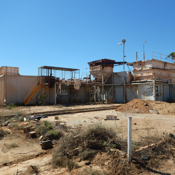 A before-and after-view of the Pro-Force site following removal of the old processing plant.